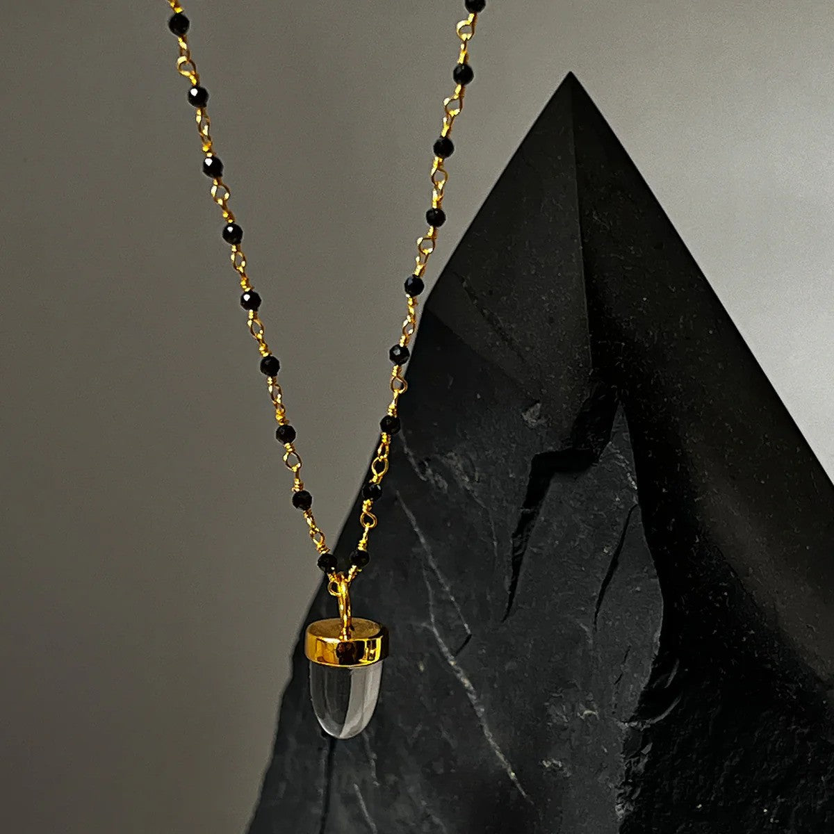 Rock Crystal Pendulum Pendant on Long Black Onyx Rosary Chain