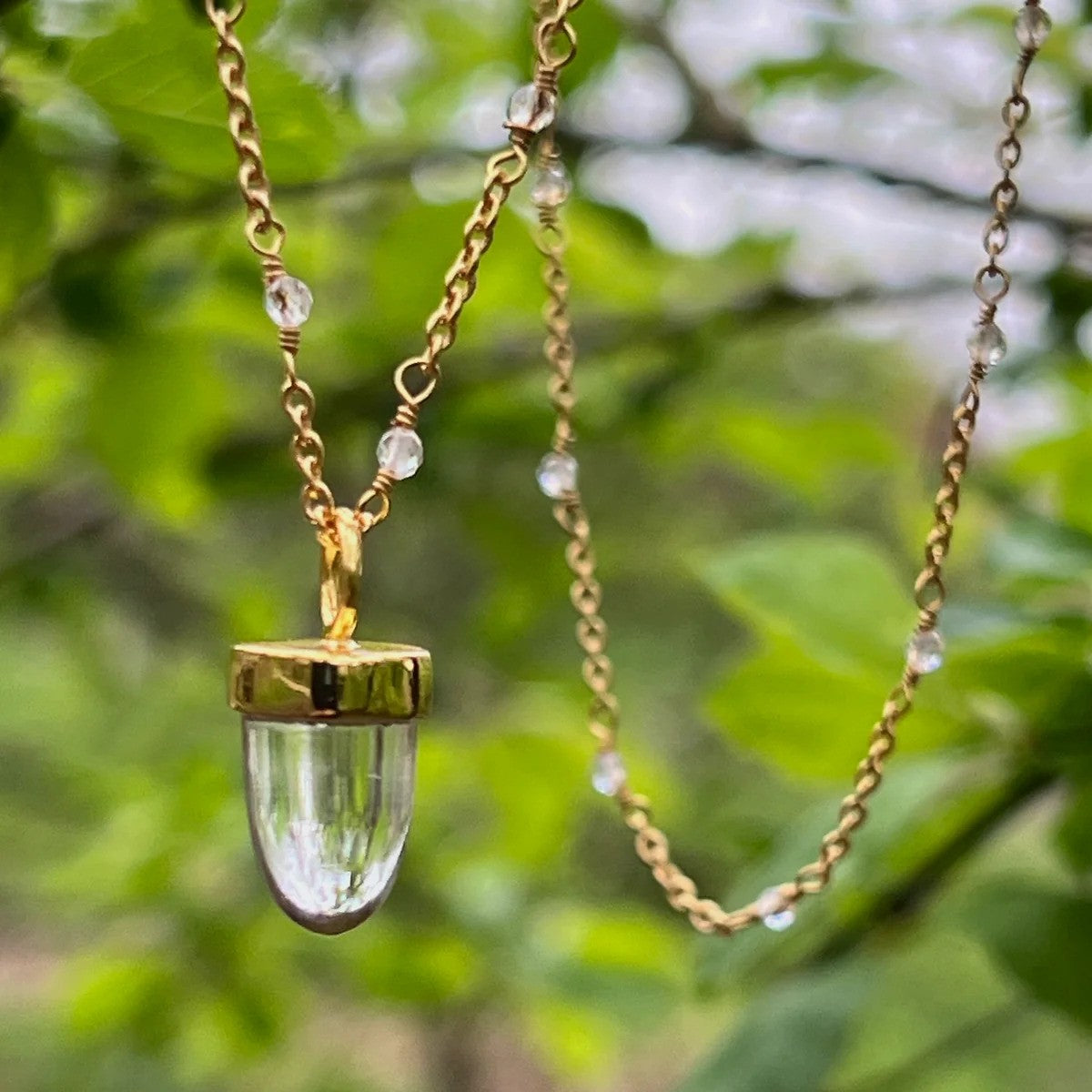 Rock Crystal Pendulum Pendant on Long Black Onyx Rosary Chain