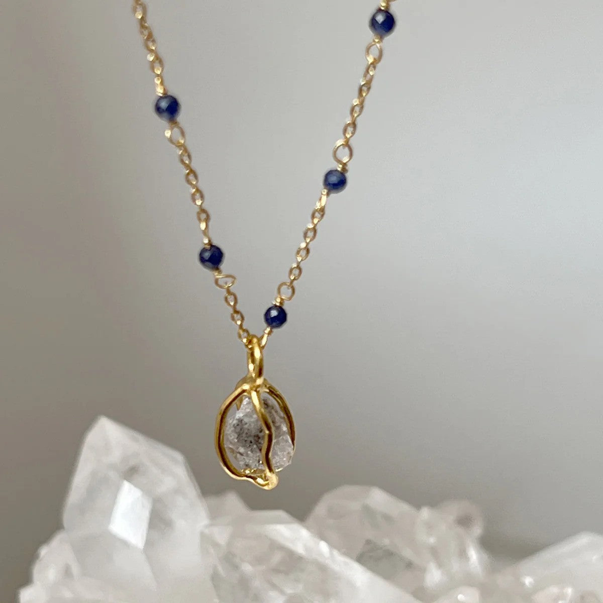 Fancy Sapphire Rosary with Raw Herkimer Diamond in Cage Pendant