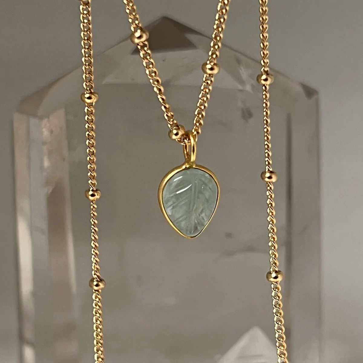 Carved Aquamarine Leaf Pendant on Gold Biba Chain